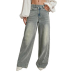 Light blue jeans worn by a person on a white background