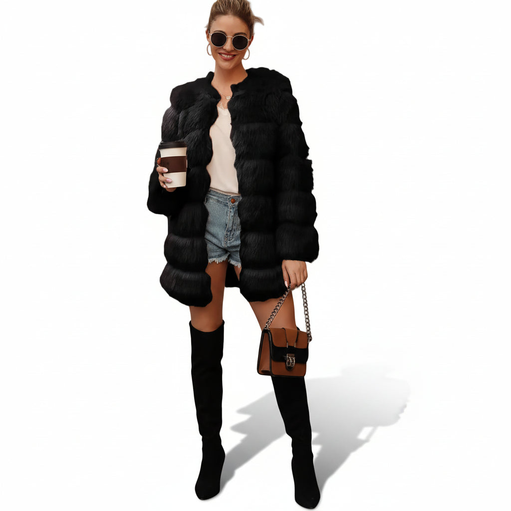 Woman wearing a black fur coat holding a coffee cup on a city street.