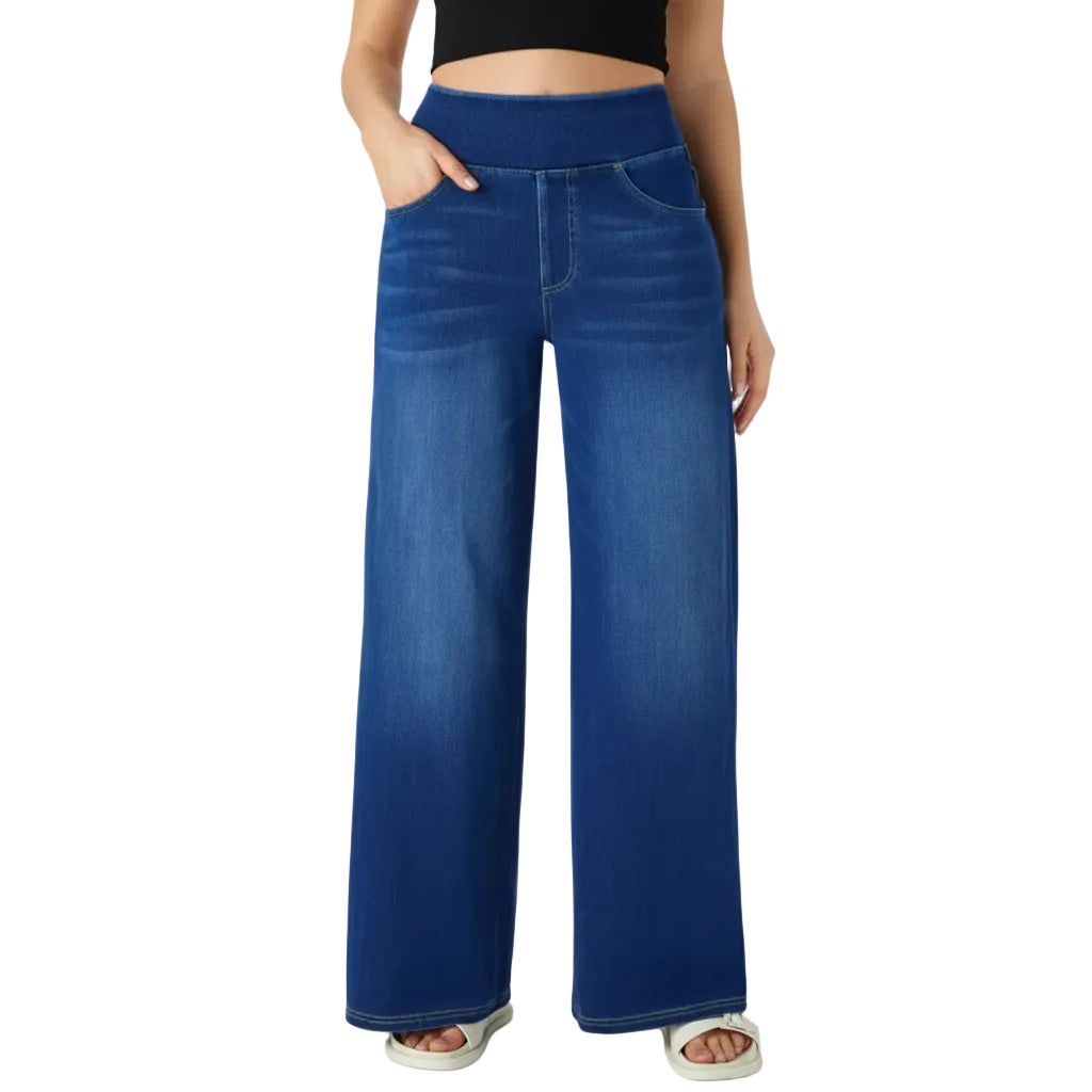 Blue wide-leg jeans worn by a person on a light gray background