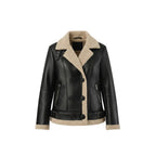 Woman wearing a black leather jacket with beige interior on a white background